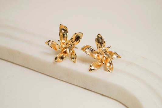 Aretes Topo Flor Baño de Oro 24K