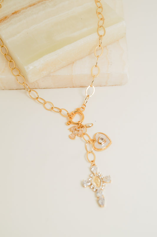 Collar de cruz y ángel